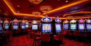 Filipino player using okbwt game lobby on Android phone to browse live casino and slot categories